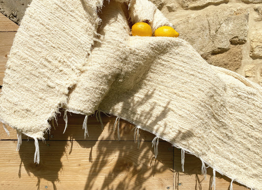 Grand tapis en coton beige, Moumoute